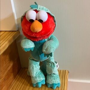 Interactive stomping elmo dinosaur